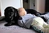 Bella cuddled by Jack